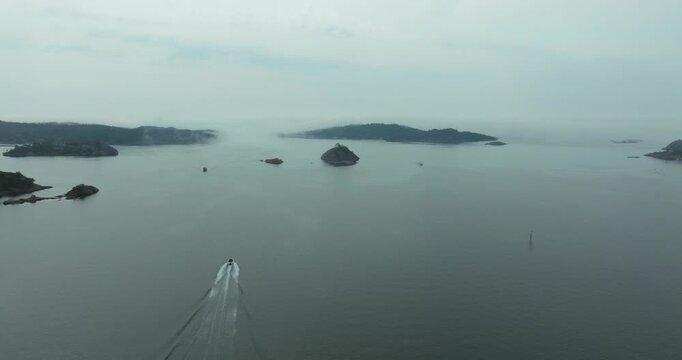 Aerial view of H&oslash;llen Norway coastal archipelago islands in slow motion