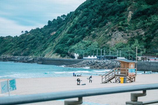 Zurriola beach in Donosti or San Sebastian with surfers in the background