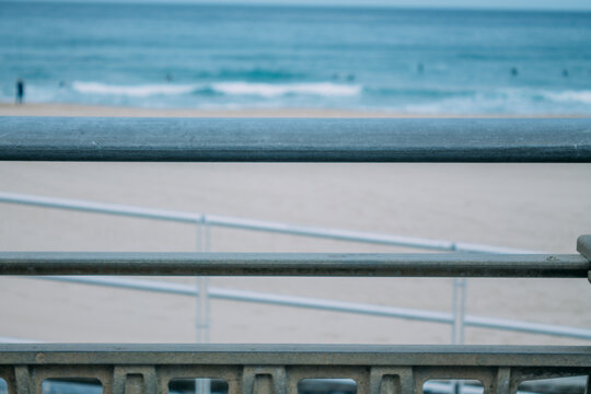 Zurriola beach in Donosti or San Sebastian with surfers in the background