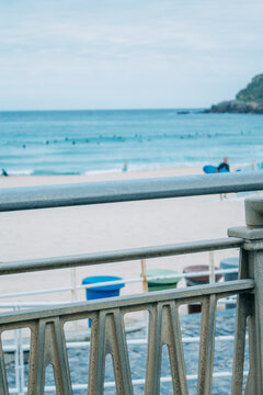 Zurriola beach in Donosti or San Sebastian with surfers in the background