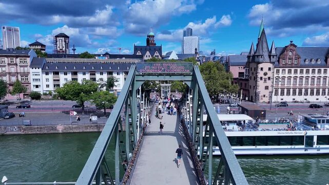 Iron Bridge In Frankfurt Am Main In Hesse Germany. Historical Bridge. Corporate Buildings. European Destination. Iron Bridge In Frankfurt Am Main In Hesse Germany. Tourism Landmark.