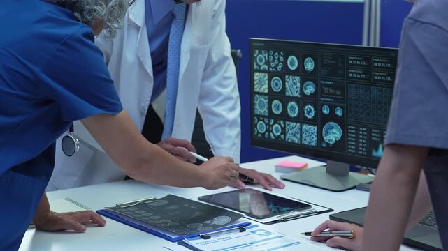 Medical team working on digital tablet healthcare doctor technology tablet using computer analyzed the results of medical reports.