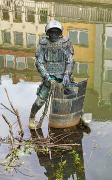 Osnabruck, Germany. Fountain of Wishes, also called as Peeing Policeman or Osnabruck's Manneken Pis. It was created in 2009 by the Spanish artist Fernando Sanchez Castillo.