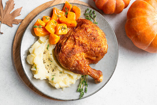 Autumn meal: roasted chicken with glazed pumpkin and mashed potato
