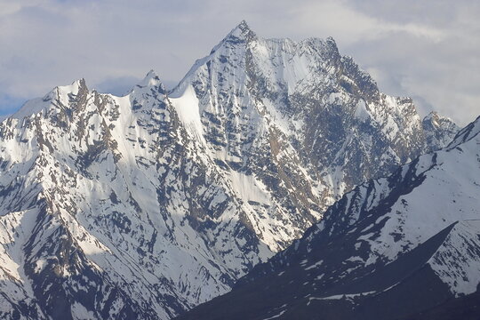 scenic mountain landscape, snowcapped himalayas of lahaul and spiti, extreme terrain. adventure travel, trekking and mountaineering in himachal pradesh, india