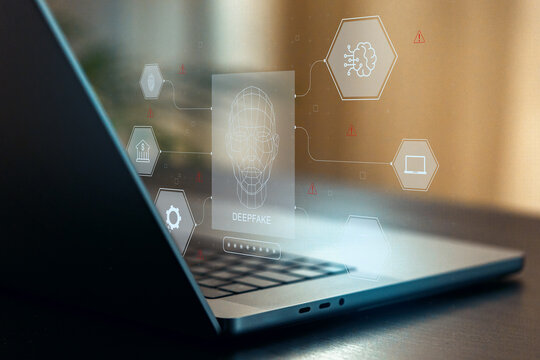 Modern laptop displays deep fake technology with various digital elements