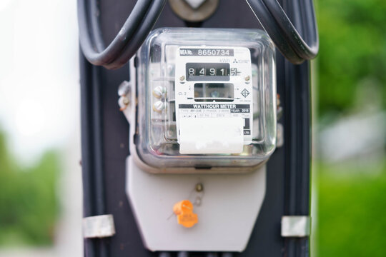 Bangkok, Thailand April 7, 2025 Electric measuring power meter for energy cost at home and office.
