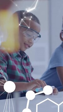 Animation of dna strand and scientific data processing over diverse children in laboratory