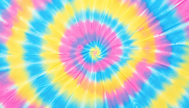 Tie dye spiral pattern on fabric, colorful textile design