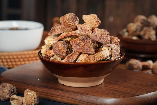 Dried Shiitake Mushrooms in Bowl on Wooden Board - Asian Cooking Ingredients