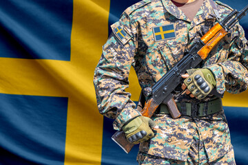 Naklejka premium Sweden flag with soldier holding assault rifle