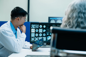 Medical team analyzing brain scans and genetic data in a modern lab to advance clinical diagnosis...