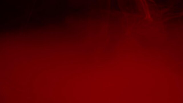 Real Red Smoke on Black Background