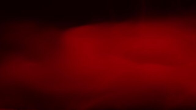Real Red Smoke on Black Background