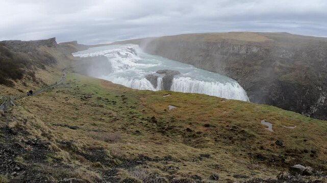 Tourists visiting the Gullfoss waterfall, one the major tourist sights of Iceland