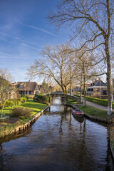 Fototapeta premium Giethoorn is a village with very little road traffic located in the Dutch province of Overijssel, in the northeastern part of the country, and is known for its canals.