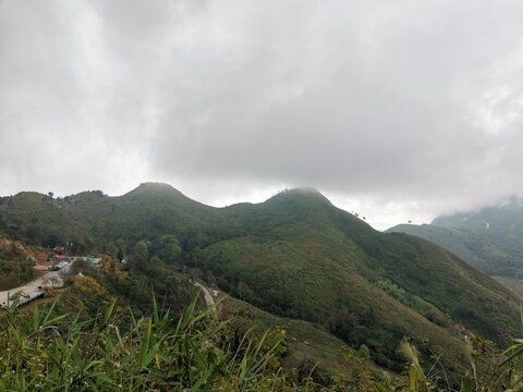 mountain and cloud sky view in dim day background