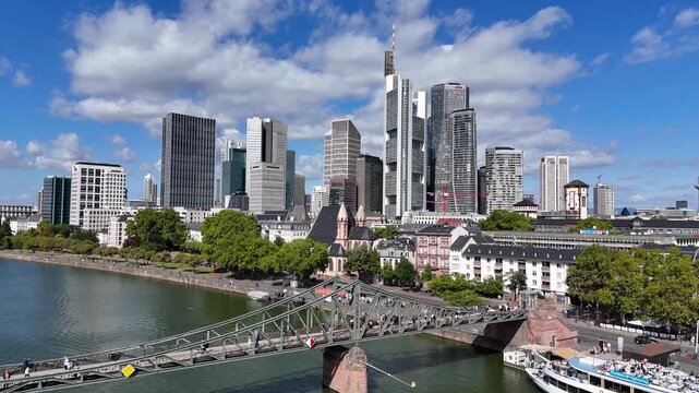 Iron Bridge In Frankfurt Am Main In Hessen Germany. Historical Bridge. Corporate Buildings. European Destination. Iron Bridge In Frankfurt Am Main In Hessen Germany. Tourism Landmark.