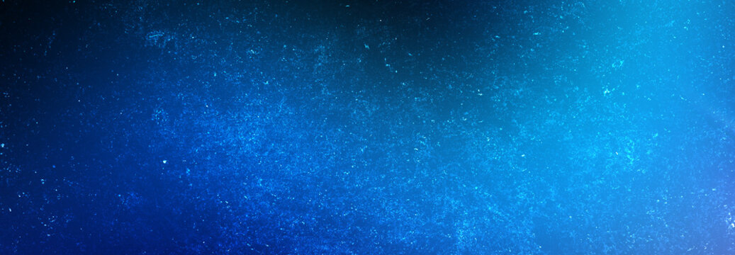 Abstract background in vibrant blue tones with subtle texture for creative design and overlay effects.