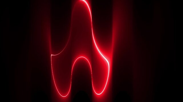 A red warning light casts an ominous glow against a dark backdrop, signaling potential danger or the need for caution