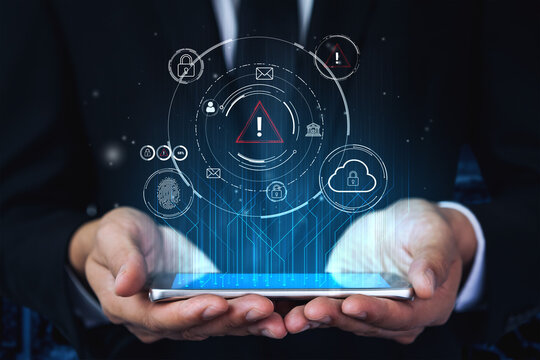 Hands Holding Smartphone with Digital Security Icons and Warning Symbol Representing Cybersecurity Risks in Modern Technology. Entropy.