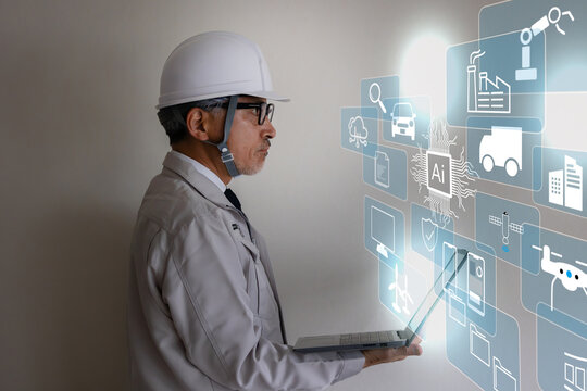AIを活用したスマート建設システムを操作するシニア建築技術者
