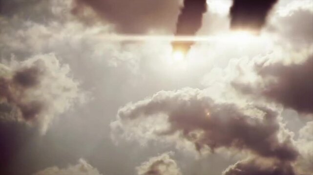 Dramatic dark storm clouds moving across the sky with bright sunlight breaking through