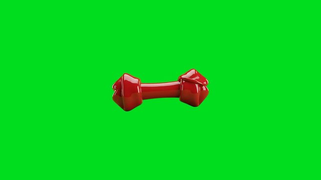 A shiny red plastic dog bone toy centered on a vibrant green background