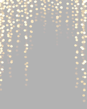 Vertical overlay of cascading golden bokeh lights Garland on transparent background
