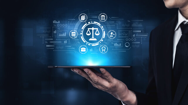 Business professional presenting digital justice scale concept with technology data and analytics on a futuristic interface for legal services and law compliance. Entropy.