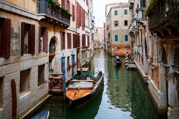 Gondolas on a Narrow Venice Canal © Ruslan Bolgov