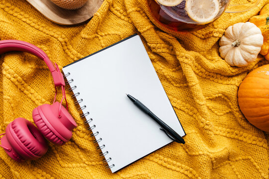 Autumn cozy lifestyle with hot tea and journal