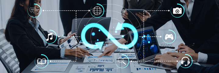 Business Meeting with Technology Integration, Collaboration, Data Analysis, and Digital Tools in a...