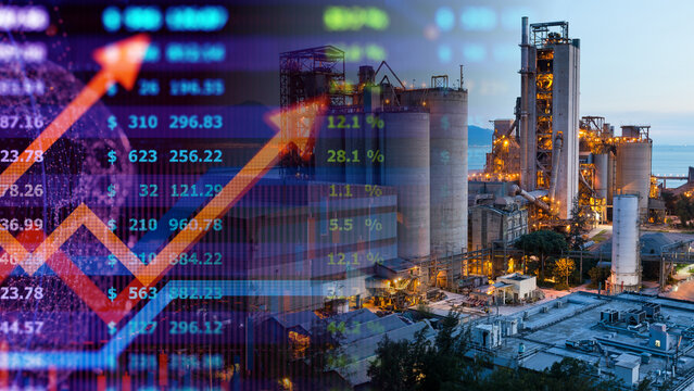 Industrial heavy manufacturing facility investment and chemical plant economic market growth concept. Large industrial cement factory or chemical plant refinery at twilight overlaying digital economic
