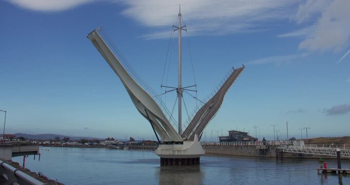 shot of Pont y Ddraig, Dragon's Bridge opening up at Rhyl harbour.
