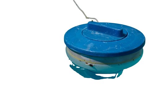 Blue floating pool chlorine dispenser isolated on a white background
