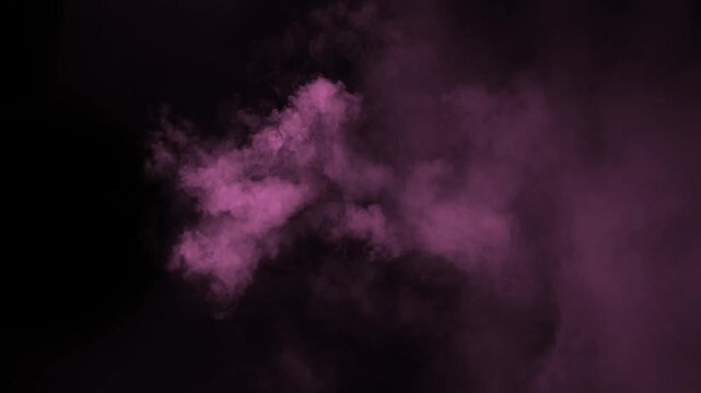 Isolated pink smoke cloud puff rising and expanding on black background