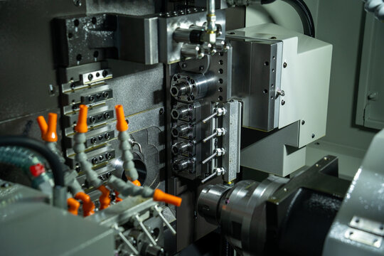 Close-up View of CNC Machine Tool Components and Coolant Nozzles