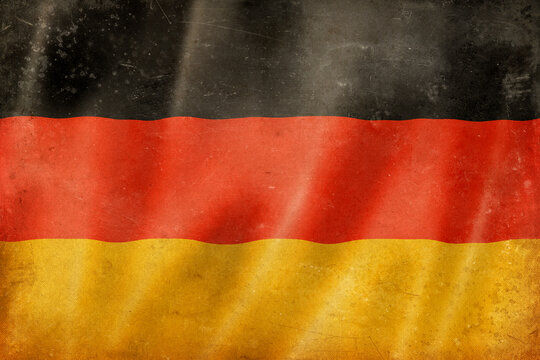 Old vintage flag of Germany, worn and stained