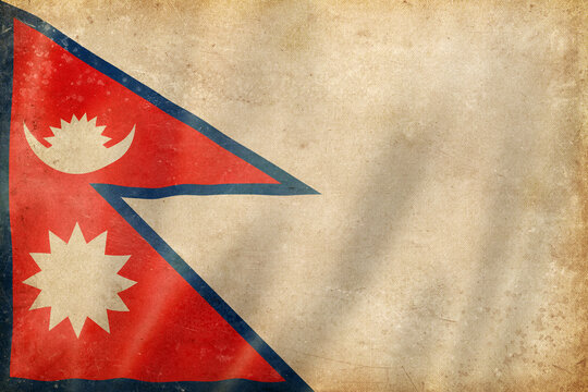Old vintage flag of Nepal, worn and stained