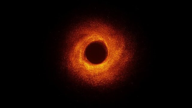 Black hole surrounded by glowing orange accretion disk in dark outer space
