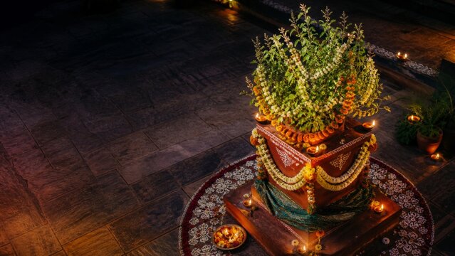 Cinematic Tulsi Vivah altar with decorated sacred basil plant