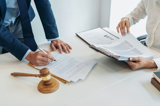 Male lawyer and professional businesswoman working and discussio