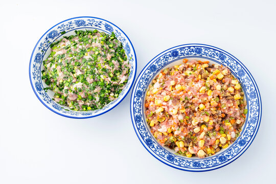 Pork, vegetable, and mushroom dumpling filling; and pork and Chinese chive dumpling filling.