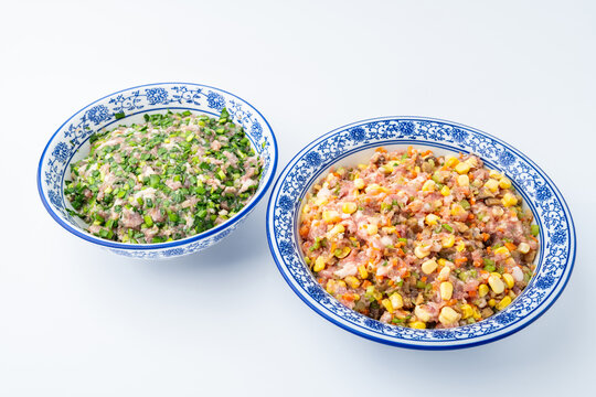 Pork, vegetable, and mushroom dumpling filling; and pork and Chinese chive dumpling filling.