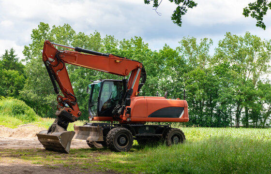 Heavy industrial machines. Excavator. Heavy equipment of excavator with hydraulic system. Excavator heavy machinery. Industrial heavy equipment. Excavator machinery in field