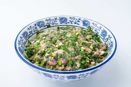 A bowl of chive and pork filling