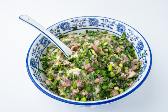 A bowl of chive and pork filling