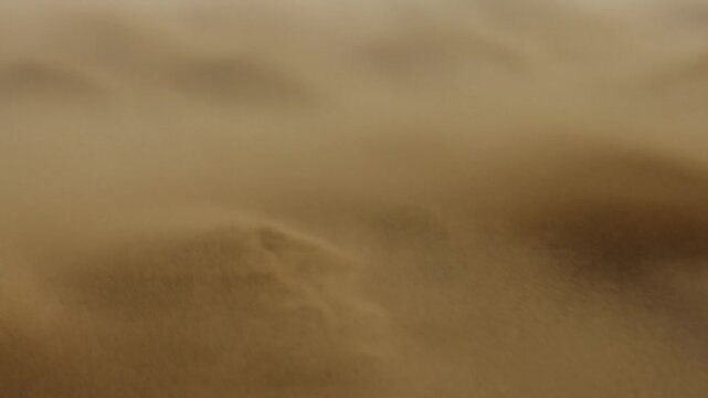 Abstract warm brown textured surface with soft diffuse highlights and subtle shadows