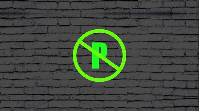 Parking symbol displayed within a prohibition circle stands out against a charcoal grey brick wall background to signify that motor vehicles are not allowed to be left in this specific urban location.